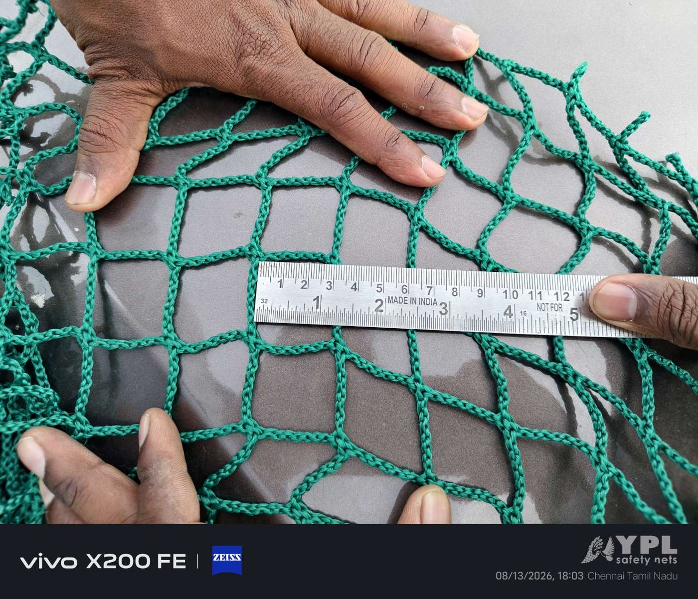 Before: safety net mesh size being measured for a Pallikaranai balcony by YPL Safety Nets Before: safety net mesh size being measured for a Pallikaranai balcony by YPL Safety Nets